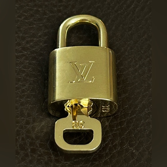 Louis Vuitton Handbags - Authentic Louis Vuitton Padlock & Key #319. Beautiful.